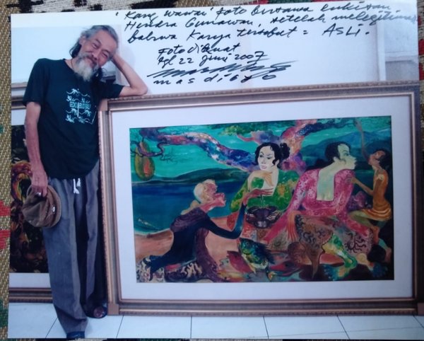 
 Hendra Gunawan maestro seni lukis Indonesia, saat memperlihatkan salah satu karyanya. (Istimewa/Bogordaily.net)