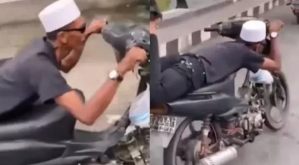 Aksi Pria Tengkurap Naik Sepeda Motor, Dihujat Netizen