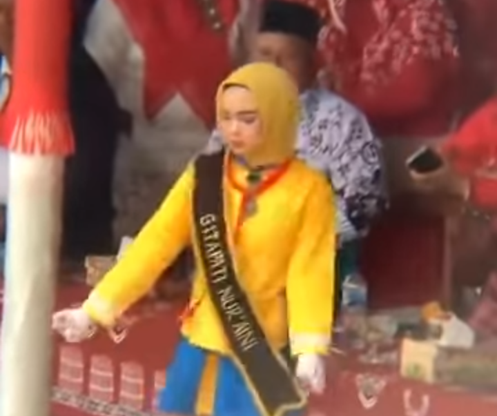 Aksi Mayoret Berjilbab Kuning Ramai Dihujat Netizen, Kenapa?